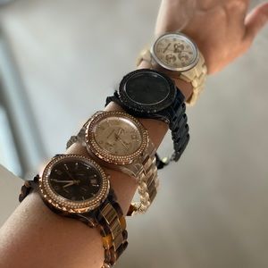 Four Micheal Kors Watches